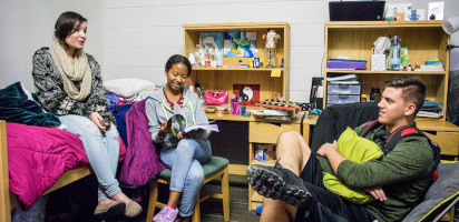 Students chatting in a dorm