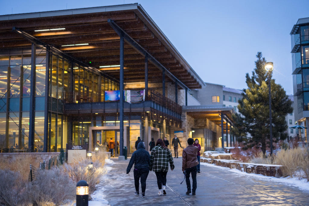 students walking toward roaring fork