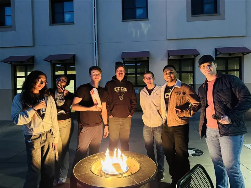 RAs hanging out at a housing event