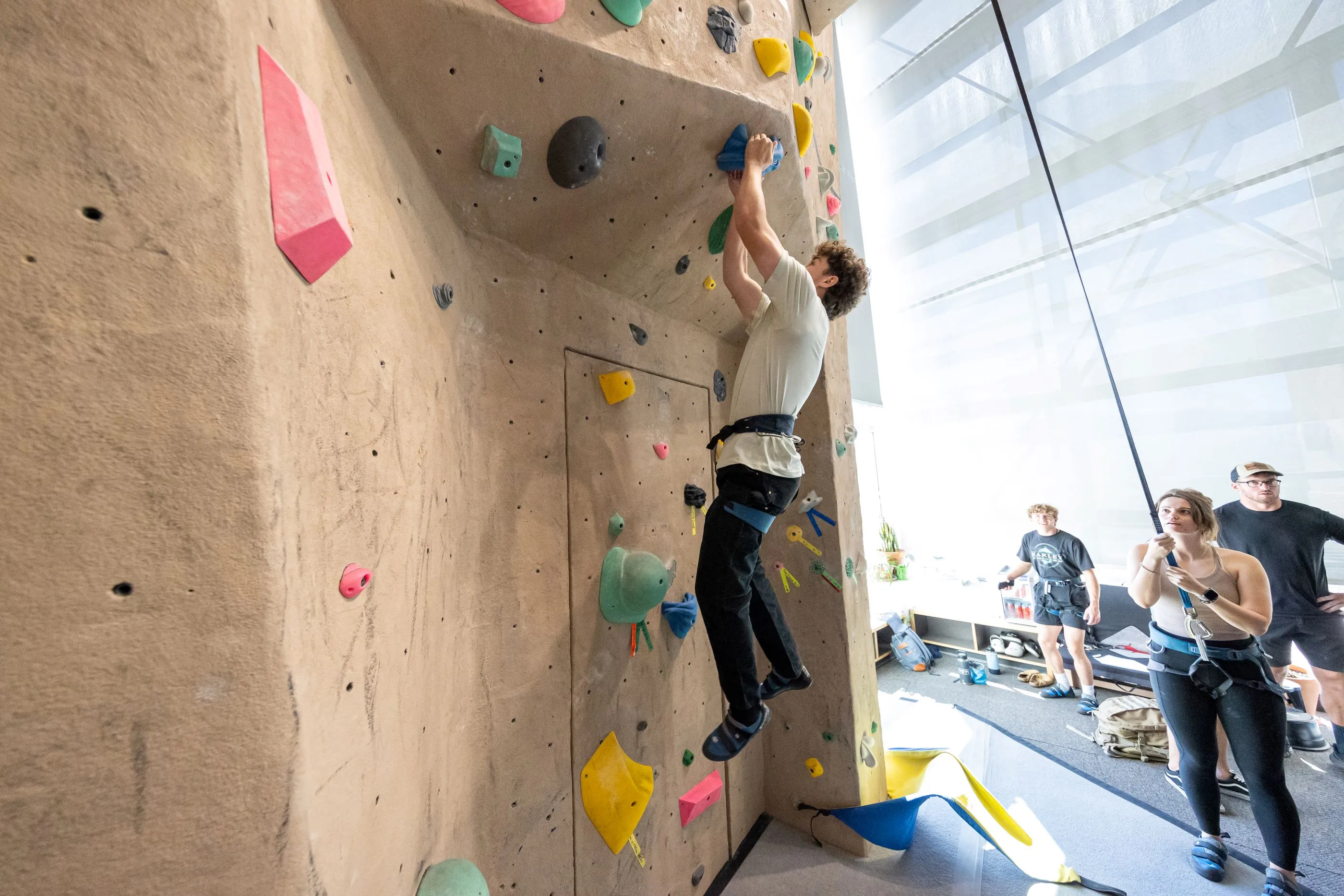 Students climbing at the rec center 